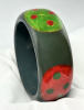 SZ29 Shultz big steel blue/dotted ovals bakelite bangle